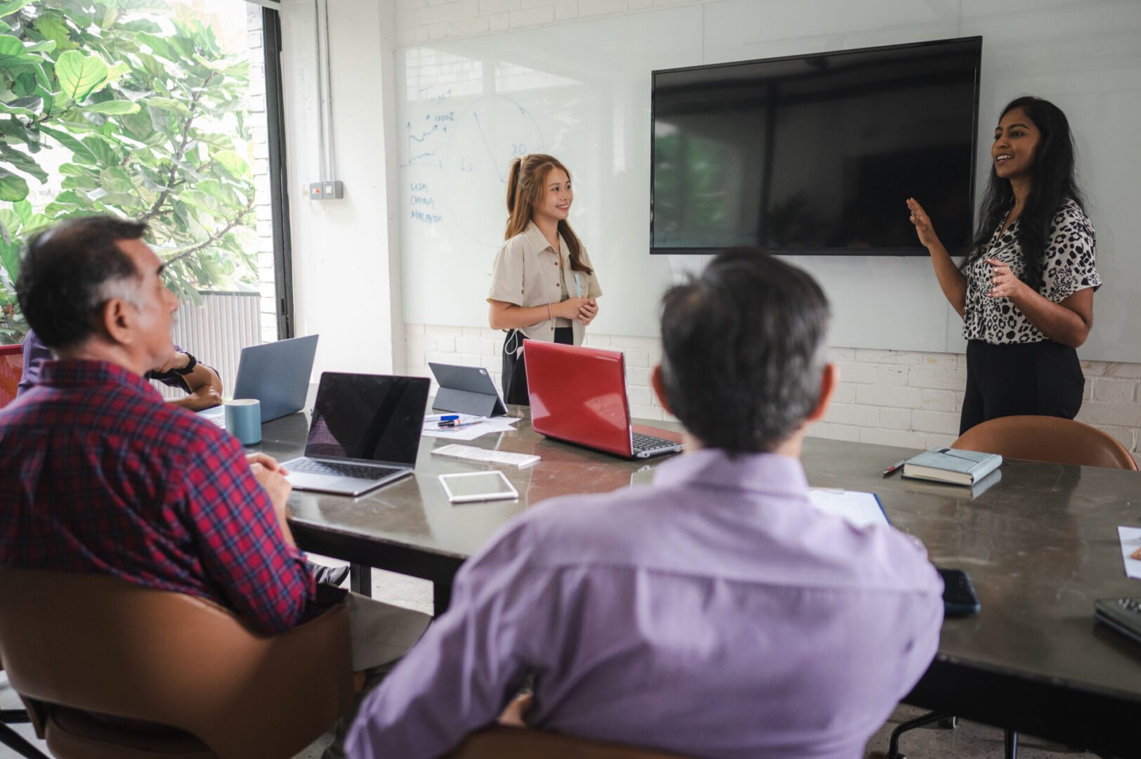 Team meeting with presentations