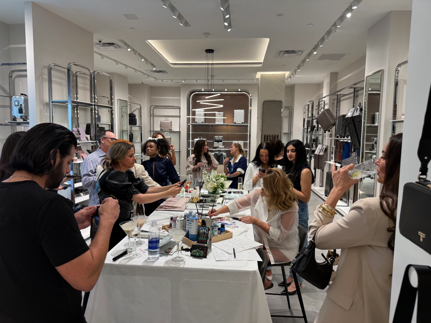 People engaged in a creative workshop around a table.
