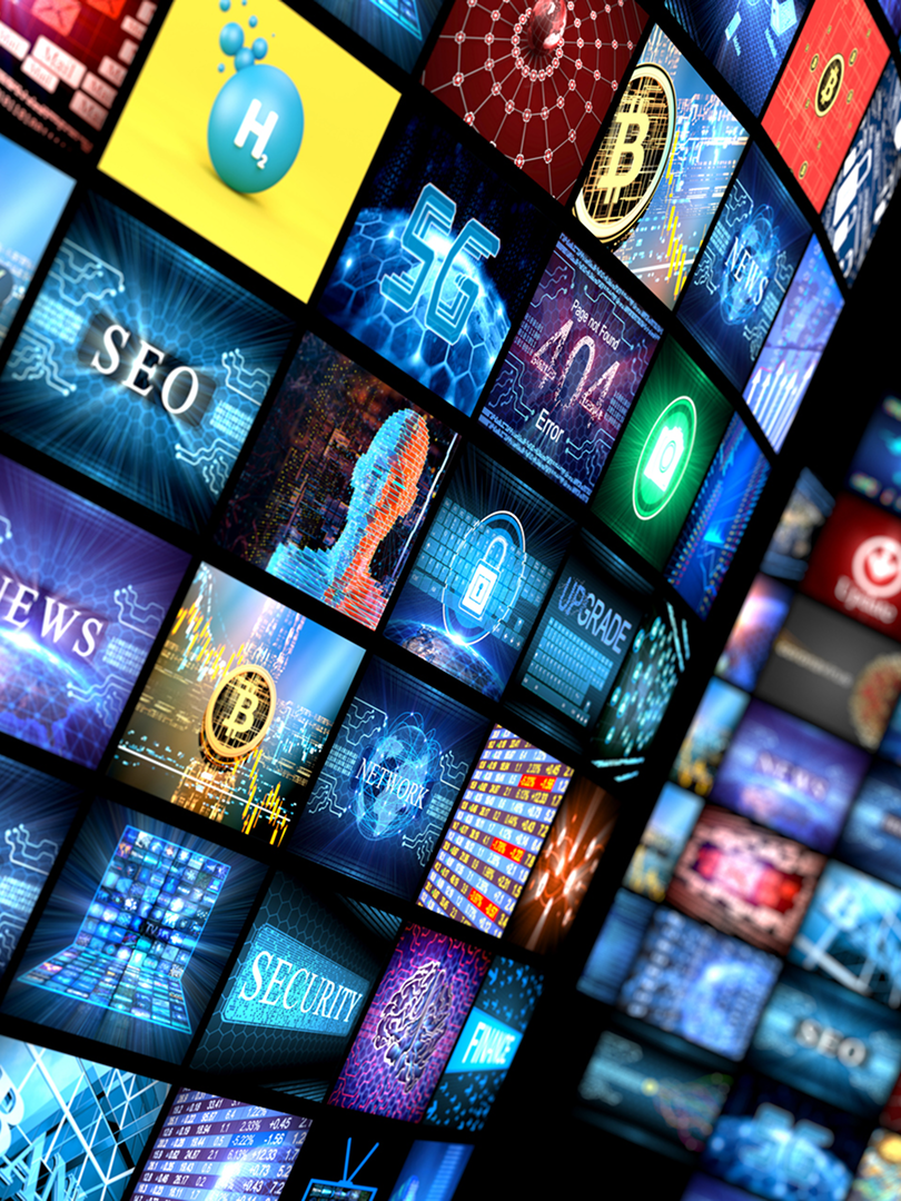 A vibrant digital wall displaying various technology and media icons.