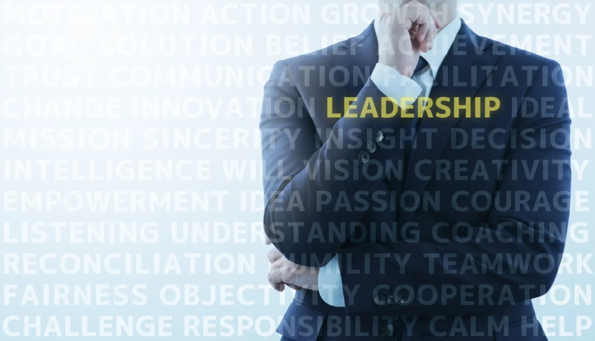 Businessman contemplating leadership concepts with text overlays.