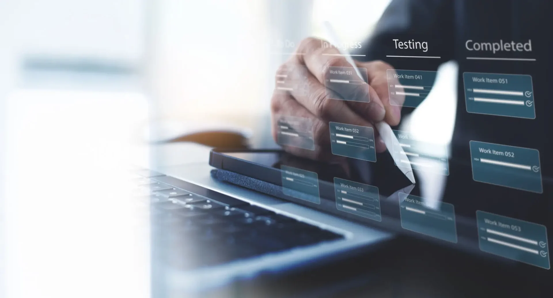 Hand interacts with floating digital interface over laptop keyboard.